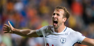 harry kane when playing for tottenham celebrating goal