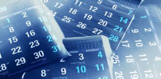 calendars piled up on top of each other dates